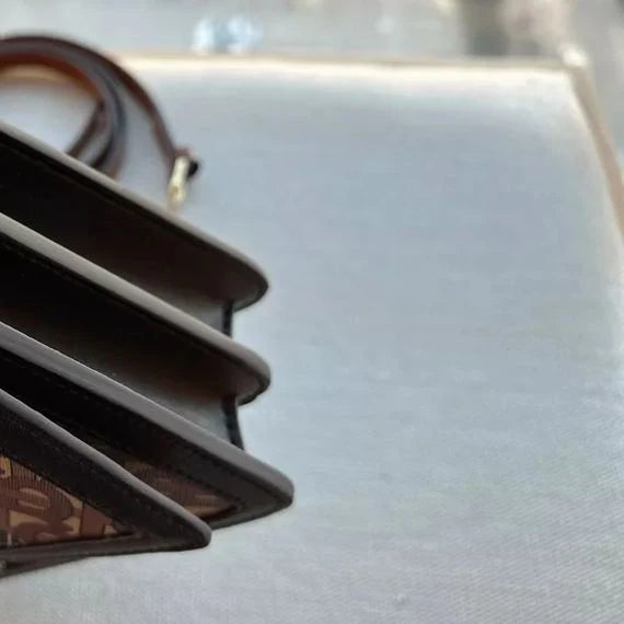 Statement Monogram Leather Crossbody Bag