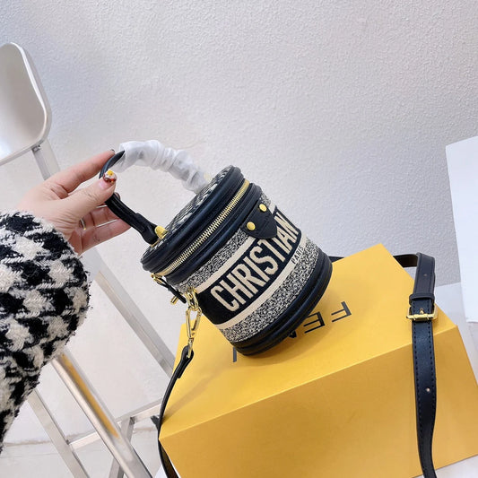 Cannes Cylinder Crossbody Bag