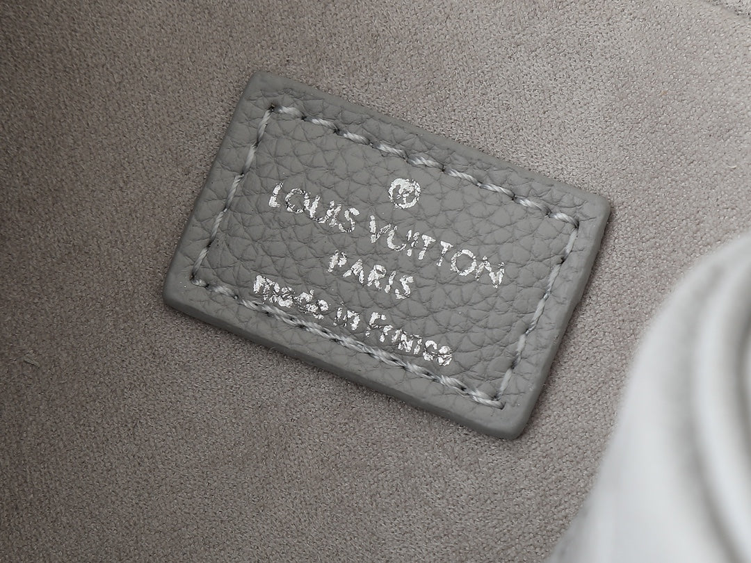 Grey embossed leather bag